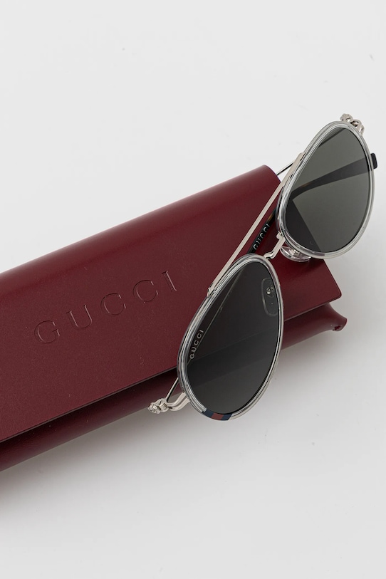 Солнцезащитные очки Gucci серебрянный GG1981S