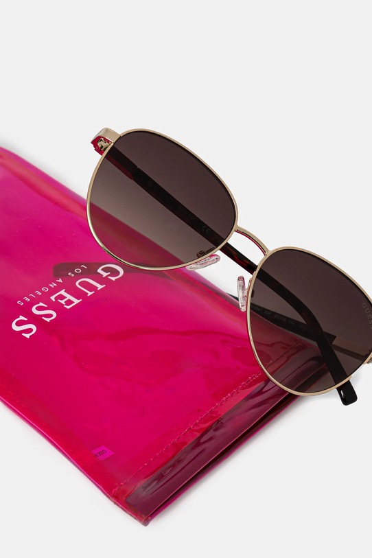 Akcesoria Guess okulary przeciwsłoneczne GU3041.5333F złoty