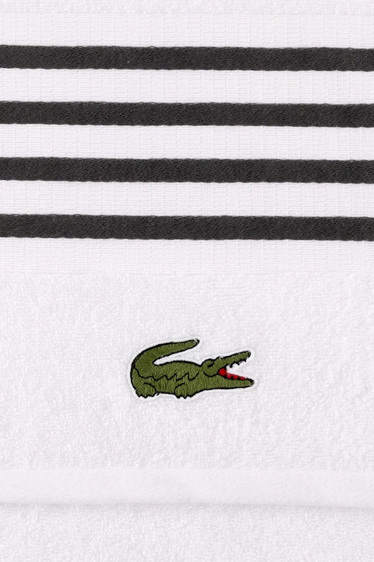 Хлопковое полотенце Lacoste LCOURTLI Bitume 70 x 140 cm 1044330 серый AA00