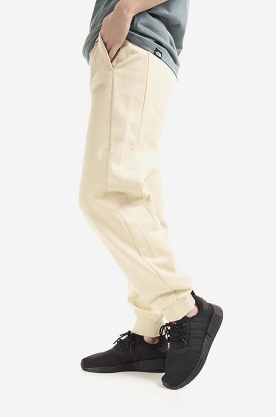 The North Face spodnie dresowe bawełniane Oversized Jogger NF0A5IGE beżowy