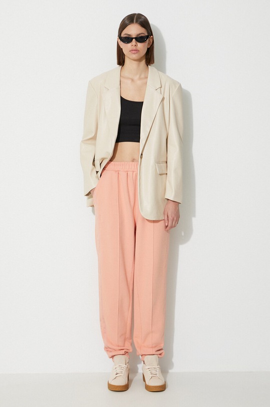 adidas Originals pantaloni de trening din bumbac x Ivy Park H61691. portocaliu AA00