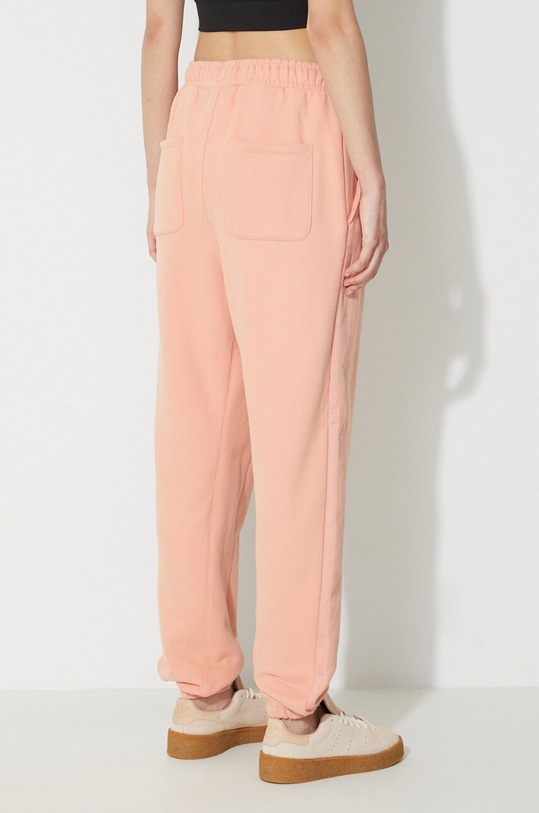 Îmbrăcăminte adidas Originals pantaloni de trening din bumbac x Ivy Park H61691. portocaliu