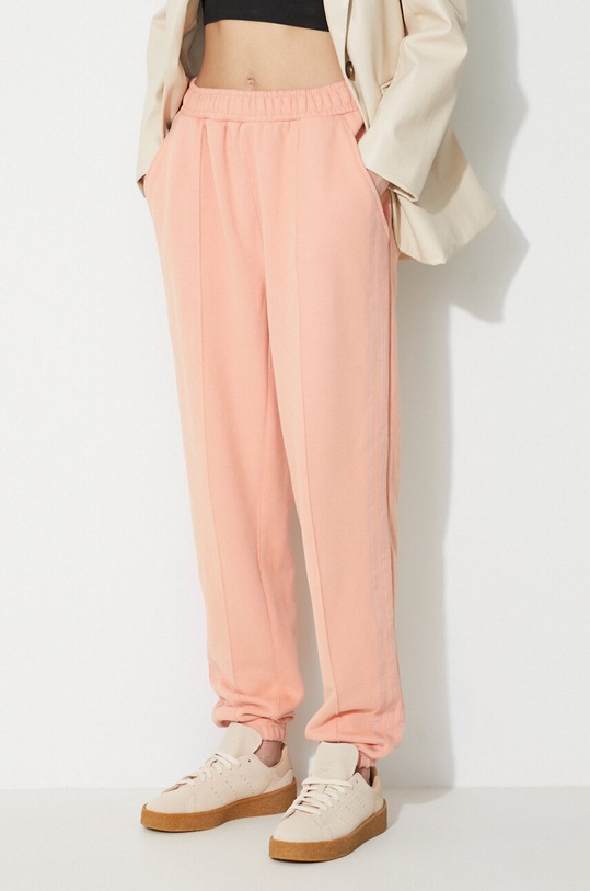 adidas Originals pantaloni de trening din bumbac x Ivy Park portocaliu H61691.