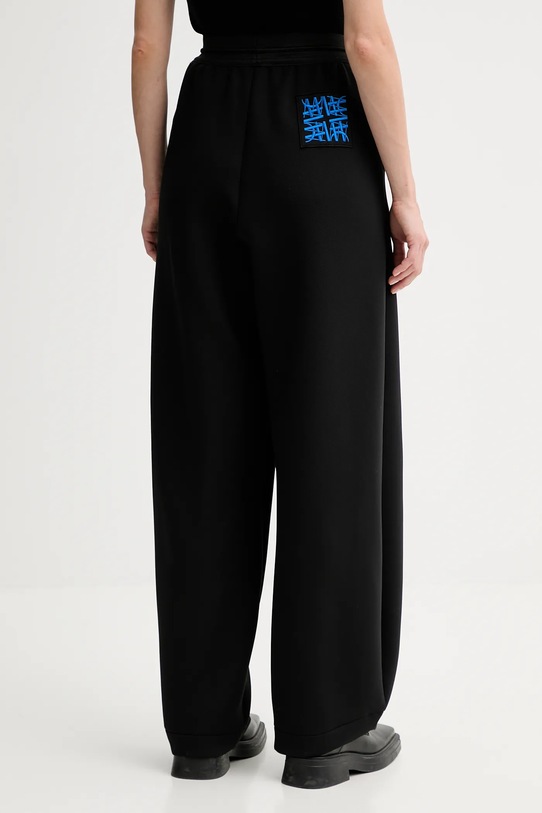 Odzież MMC STUDIO spodnie dresowe VERITE.SWEATPANTS czarny