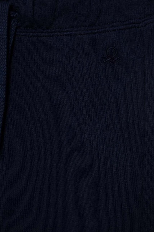 Chłopiec United Colors of Benetton spodnie dresowe bawełniane dziecięce 3J70GF01N.P.NOS granatowy