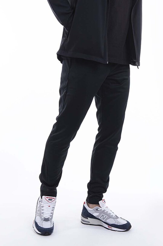 New Balance joggers Teamwear Training EMP9040BK black