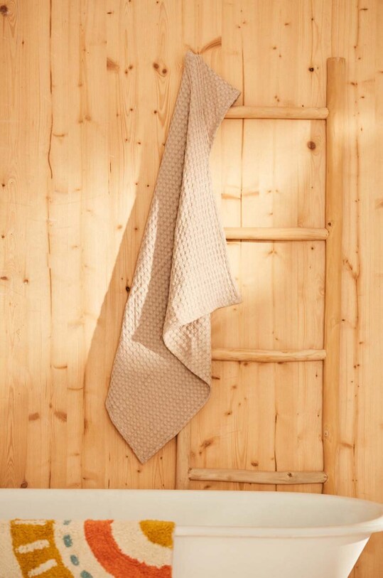 Bavlnený uterák Calma House Ola béžová OLA.CAP.PIE