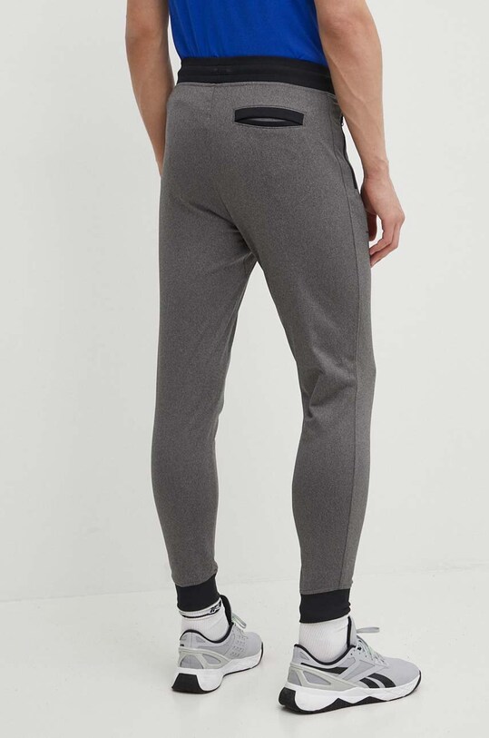 Odzież Under Armour Spodnie 1290261. 1290261. szary