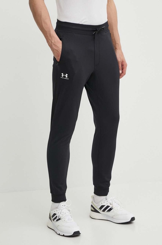 Kalhoty Under Armour 1290261. pletenina černá 1290261.