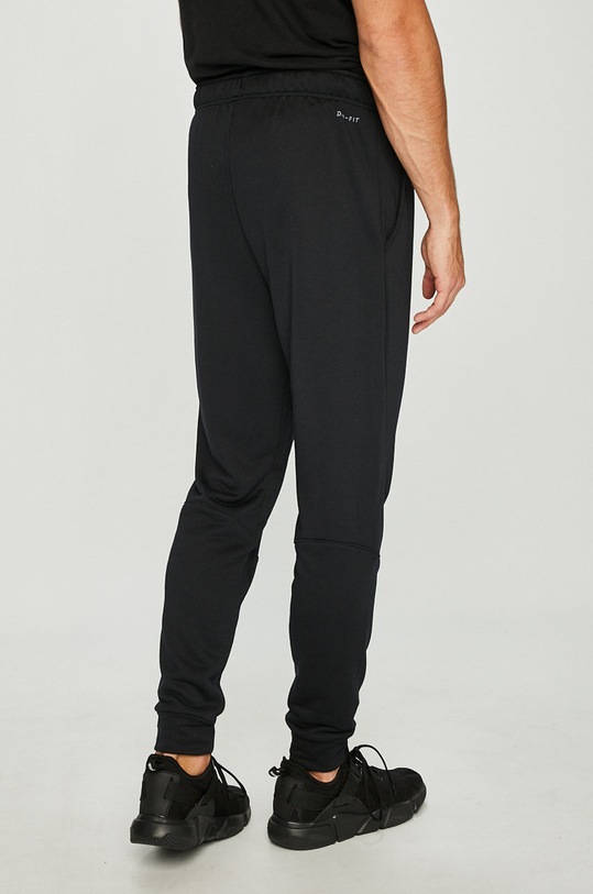 Odzież Nike - Spodnie 860371 czarny