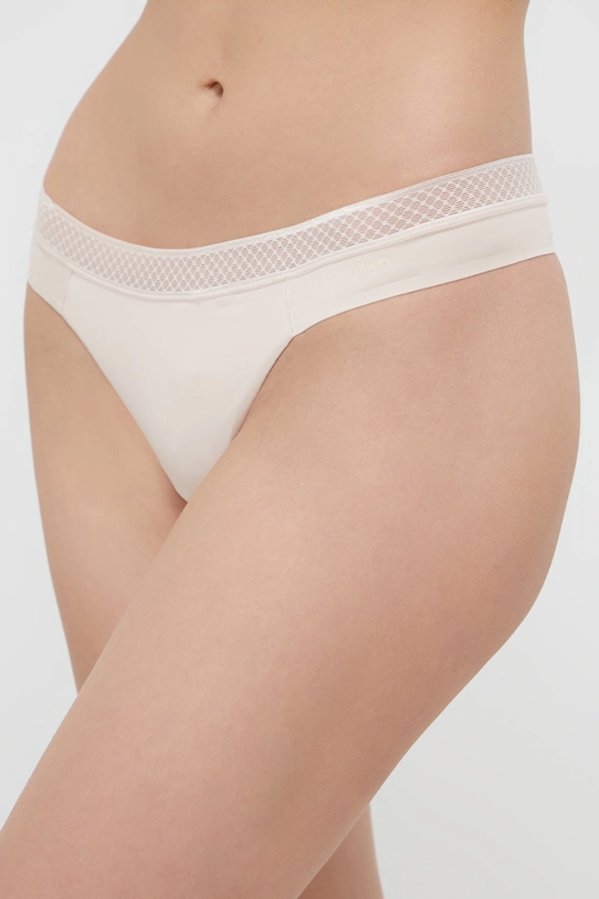 Стринги Calvin Klein Underwear трикотаж бежевый 000QF6307E.4890