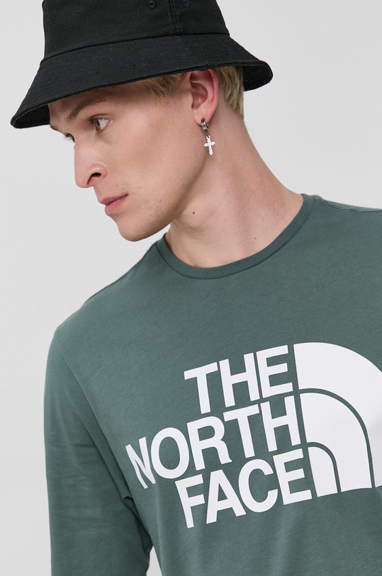 Bavlnené tričko s dlhým rukávom The North Face zelená NF0A5585HBS1
