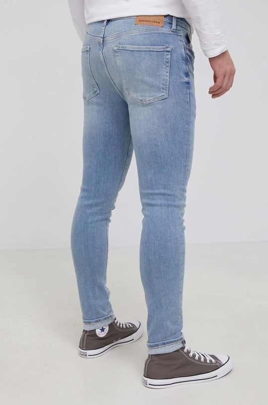 Odzież Superdry jeansy M7010114A.6CP niebieski