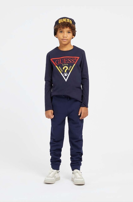 Guess Spodnie dziecięce dzianina granatowy L93Q24.KAUG0