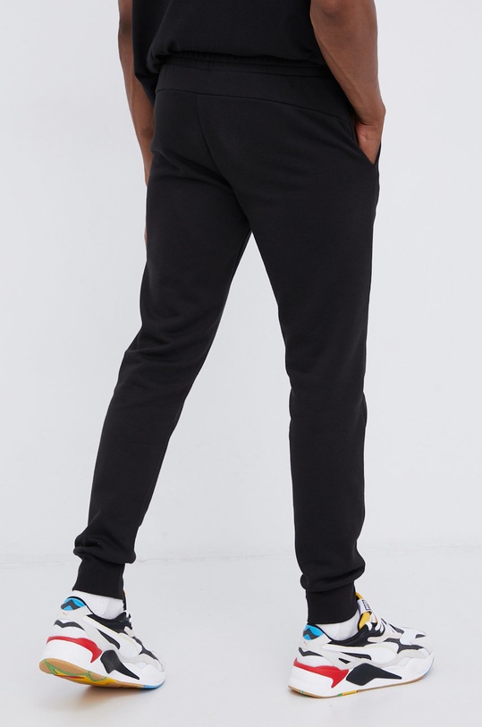 Odzież Puma spodnie 586748 czarny
