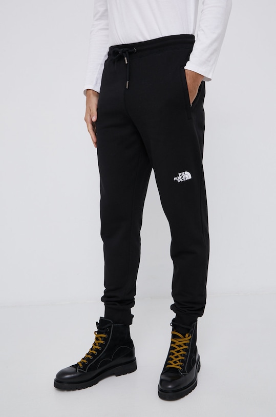 The North Face Spodnie bawełniane bawełna czarny NF0A4SVQJK31
