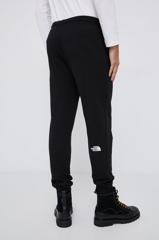 The North Face Spodnie bawełniane czarny NF0A4SVQJK31
