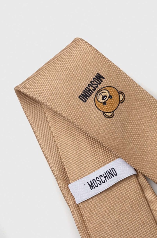 Moschino krawat jedwabny M5347.55060 beżowy SS25