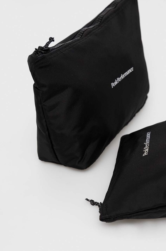 Kozmetička torbica Peak Performance 2-pack G77942 crna SS24