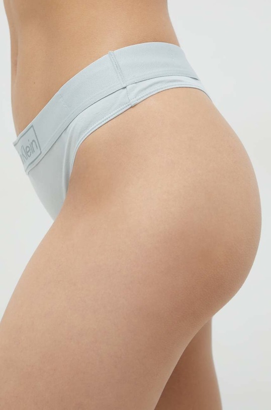 Calvin Klein Underwear stringi 000QF6774E.9BYY turkusowy AW22