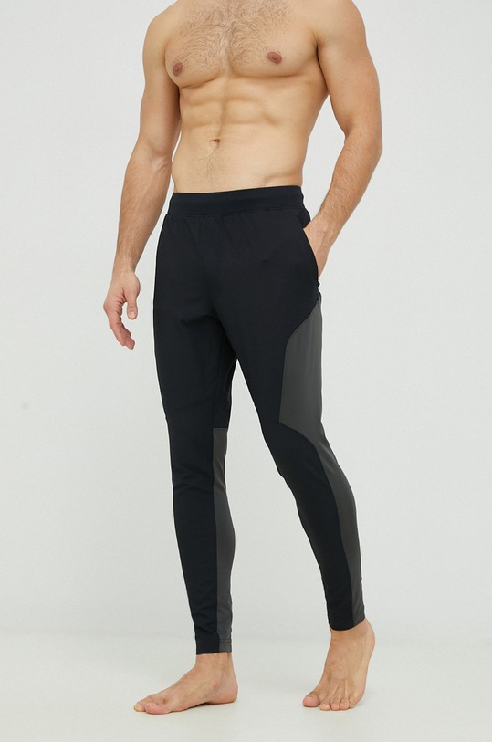 Tréningové nohavice Under Armour Unstoppable Hybrid s elastanom čierna 1373788