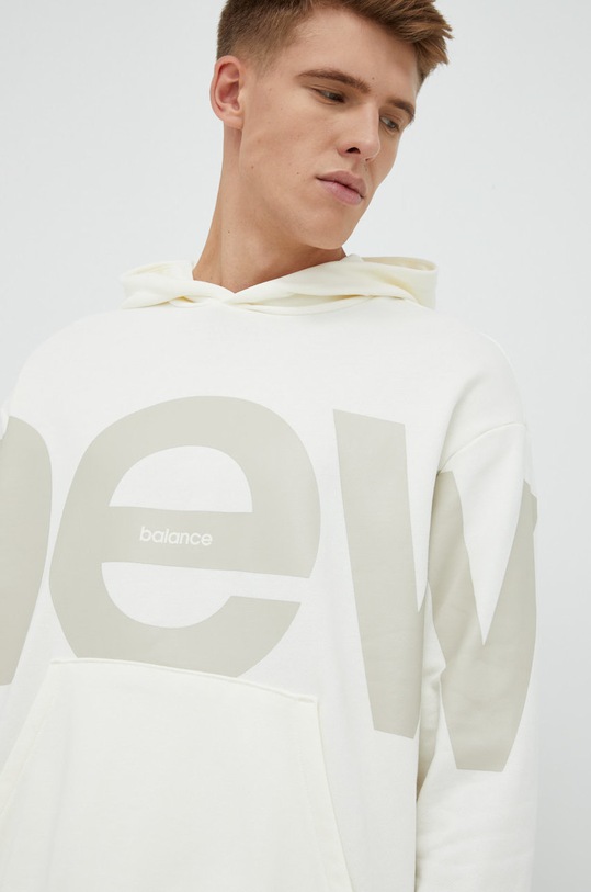 New Balance bluza bawełniana beżowy UT23504SST