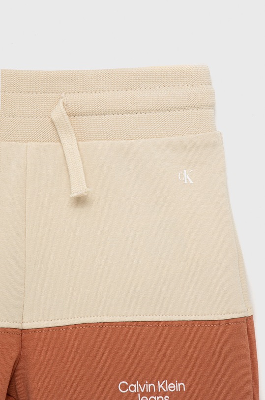 Dětská tepláková souprava Calvin Klein Jeans béžová IN0IN00020.9BYY