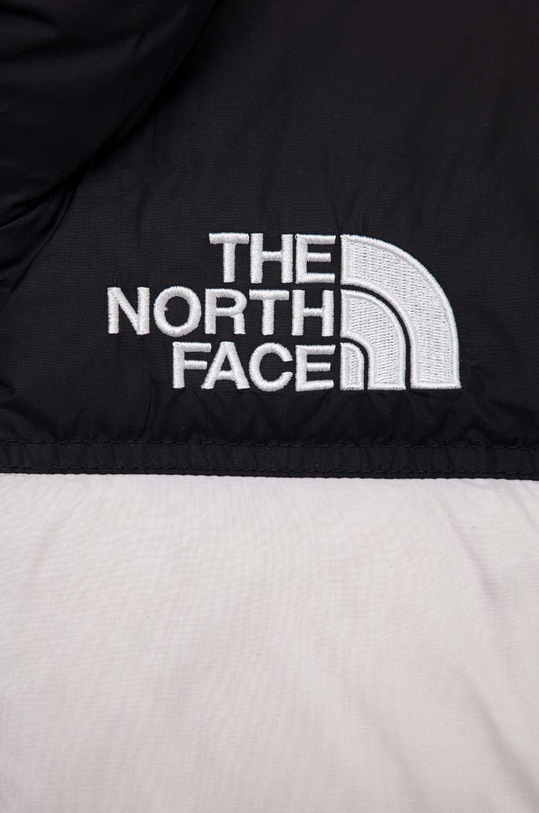 Chłopiec The North Face kurtka puchowa dziecięca TEEN 1996 RETRO NUPTSE JACKET NF0A7WQO fioletowy