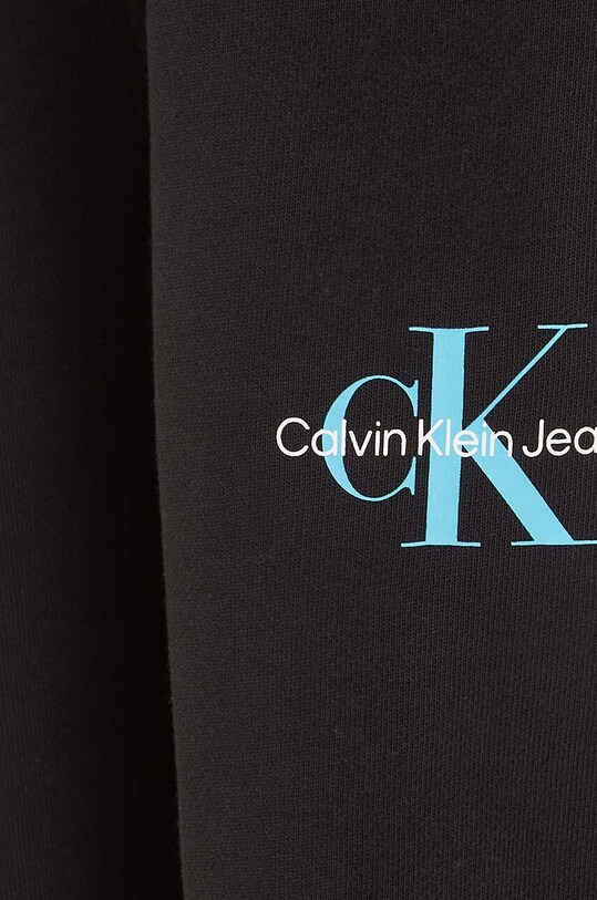 Dětské bavlněné tepláky Calvin Klein Jeans černá IU0IU00285.9BYY