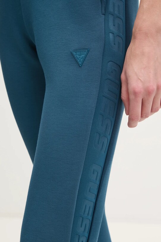 Спортивні штани Guess ALLIE бірюзовий V2YB18.K7UW2