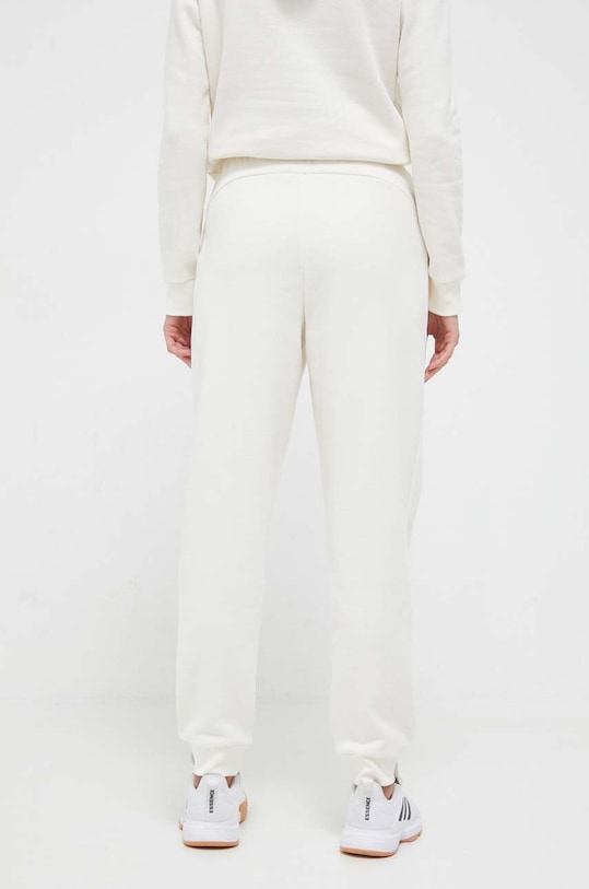 Odzież Puma spodnie 670007. beżowy