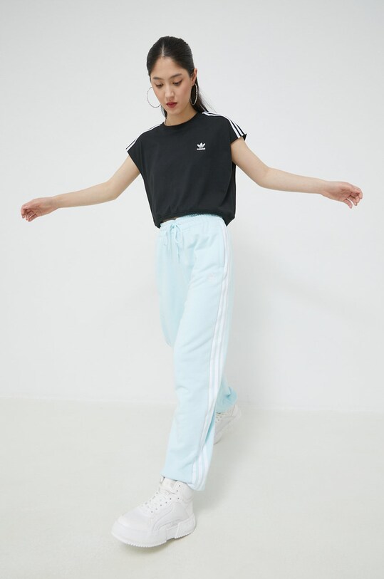 Bavlnené tepláky adidas Originals HM2144 modrá AW22