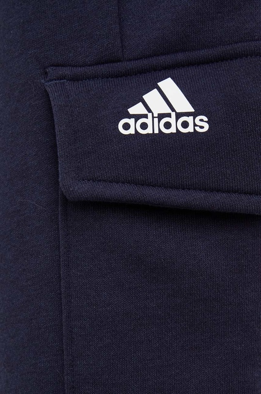 Oblačila Spodnji del trenirke adidas HL2107 mornarsko modra
