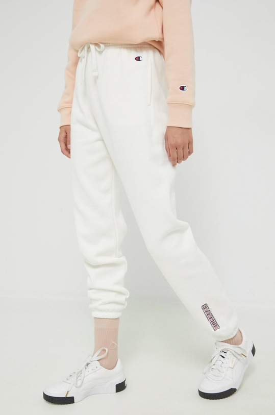 Champion spodnie 115445 beżowy AW22