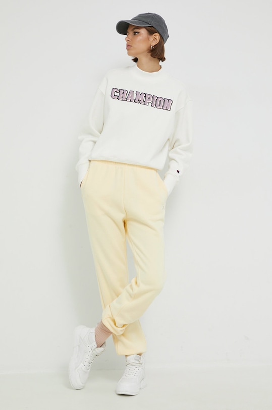 Champion spodnie dresowe aplikacja żółty 115487