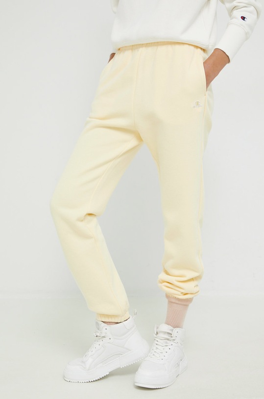 Champion spodnie dresowe 115487 żółty AW22
