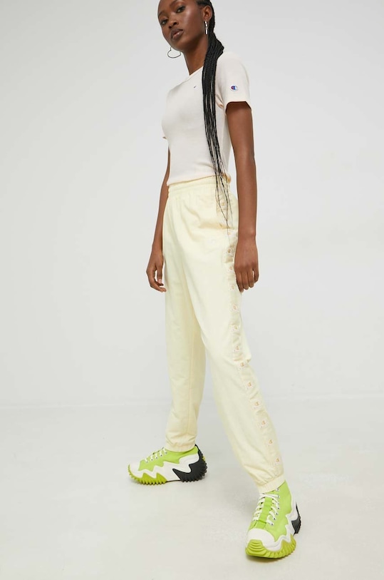 Champion melegítőnadrág 115495 sárga AW22