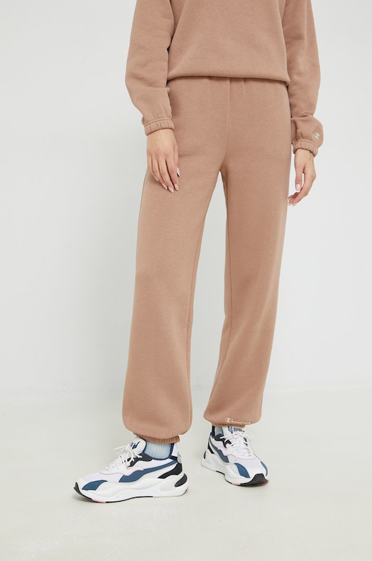 Champion spodnie dresowe dzianina beżowy 115668