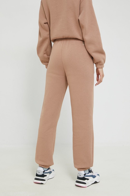 Odzież Champion spodnie dresowe 115668 beżowy