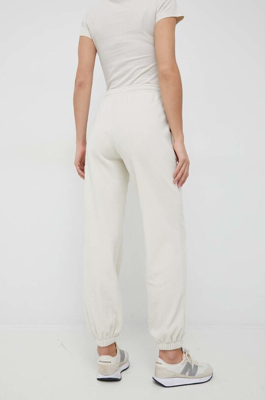 Tepláky Calvin Klein Jeans J20J219742.9BYY béžová AW22