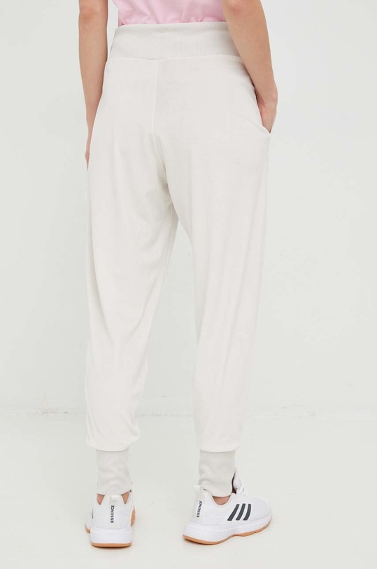 Îmbrăcăminte adidas pantaloni de trening HC8818 bej