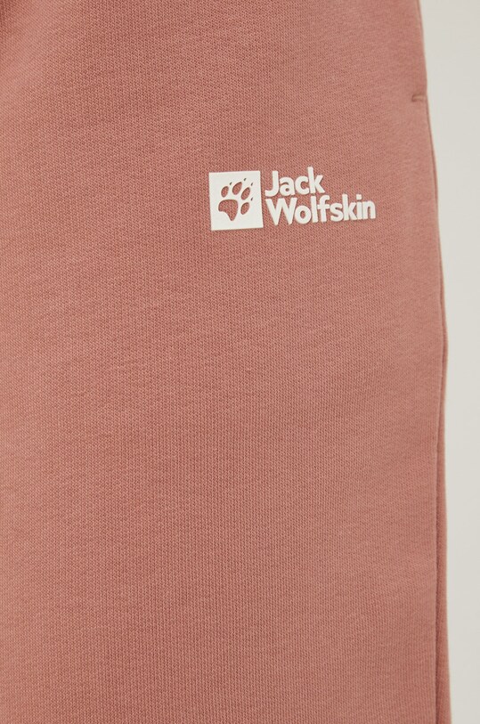 Jack Wolfskin spodnie dresowe bawełniane różowy 1507092