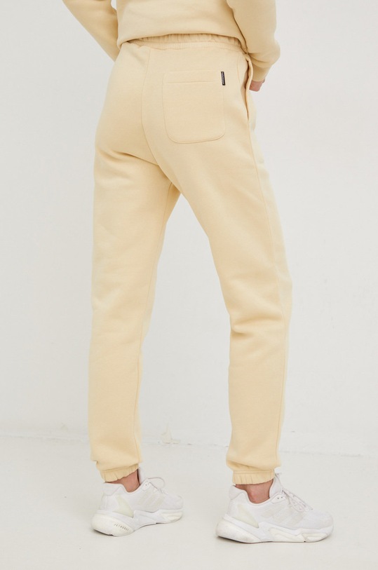 Îmbrăcăminte Peak Performance pantaloni de trening G77708 bej
