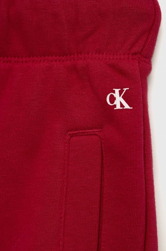 Deklice Otroški spodnji del trenirke Calvin Klein Jeans IG0IG01509.9BYY bordo