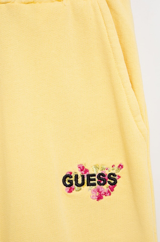 Dziewczynka Guess spodnie dresowe dziecięce J2YQ13.KA6R3 żółty