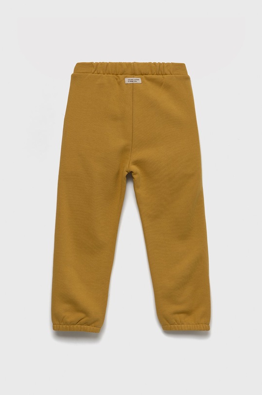 Detské bavlnené tepláky United Colors of Benetton 3QLAGF015.P žltá AW22