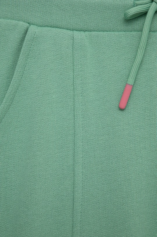 Dziewczynka United Colors of Benetton spodnie dresowe bawełniane dziecięce 3J74CF01I.G turkusowy