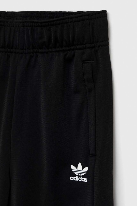 Dziewczynka adidas Originals spodnie dresowe dziecięce HL6937 czarny