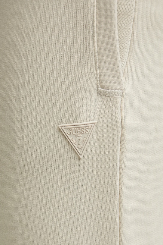 Guess spodnie dresowe ALDWIN beżowy Z2YB22.KAIJ1