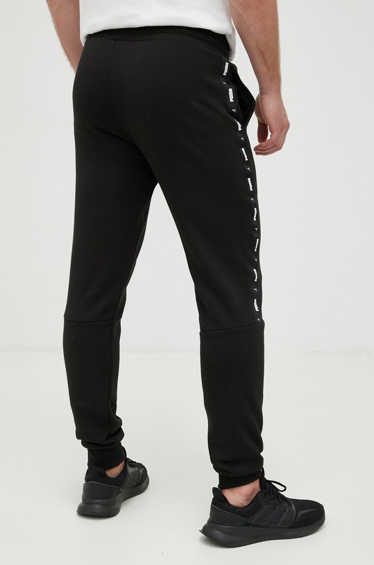 Odzież Puma spodnie dresowe 849042 czarny
